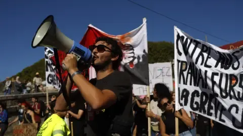 Countrywide Protests Erupt Opposing Spending Reductions